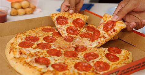 caesars  offering buy     pizzas  canada dished
