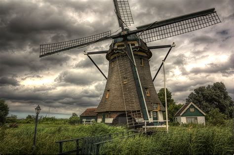 stormy windmill holland windmills netherlands windmills windmill