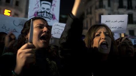 egypt s women brandish knives at sex assault protests