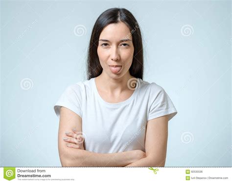 funny expressive teen girl sticking out tongue stock image 24433669