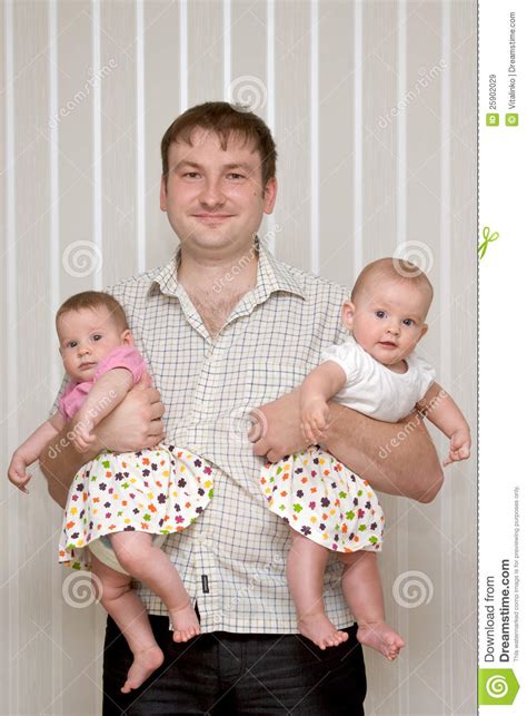 father with two lovely twins royalty free stock images image 25902029