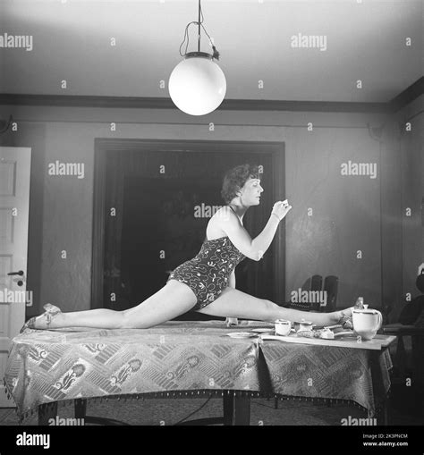 woman of the 1940s a woman is seen practising gymnastics while having