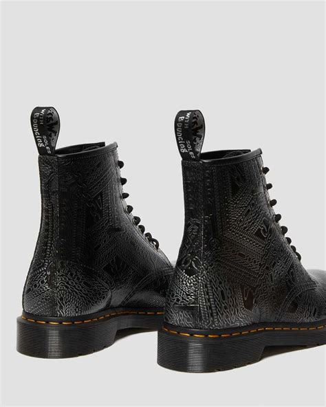arcadia embossed ankle boots dr martens