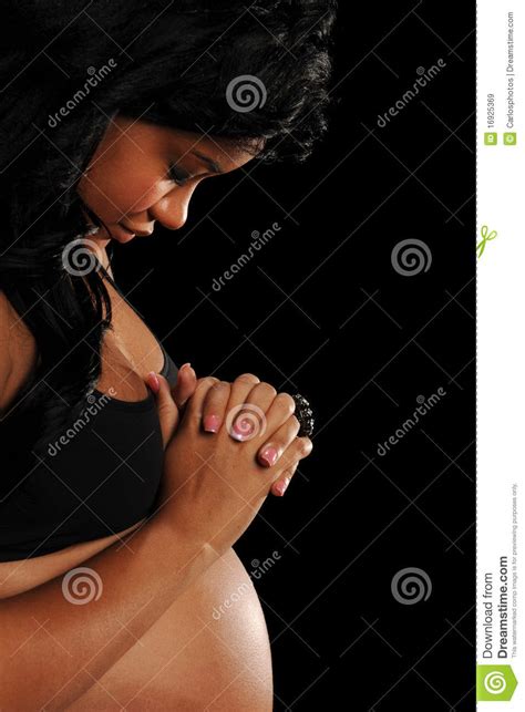 Young African American Woman Pregnant Praying Stock Image