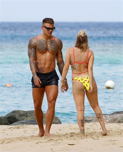 olivia buckland displays her tattooed body in barbados 29