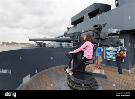children playing   gun turrets battleship texas   world