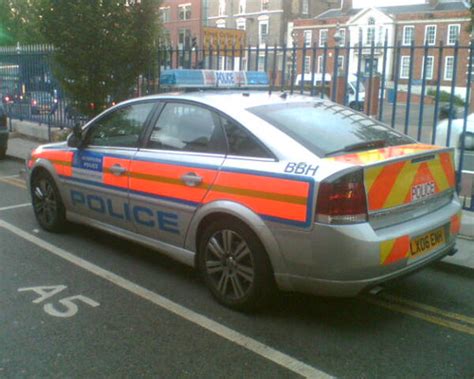lx06ewh bbh met police vauxhall vectra outside kings colle