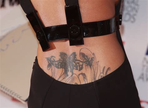 cheryl cole reveals new giant back tattoo on girls aloud s