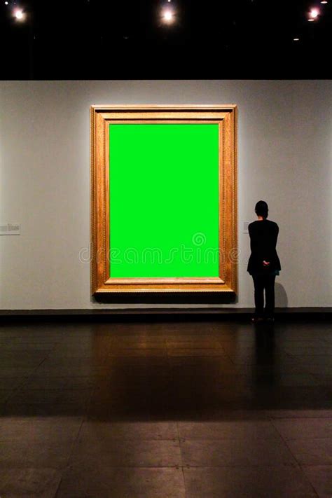 green screen photo frame  displays large images   museum   audience walking