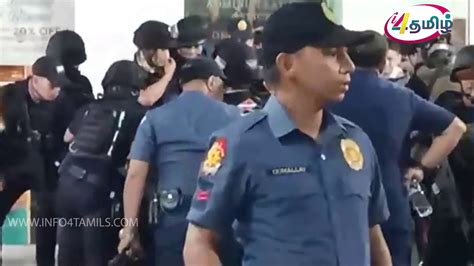 philippines disgruntled  security guard tackled  police  releasing  hostages
