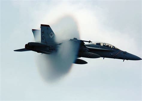 photo supersonic jet cloud fighter flying