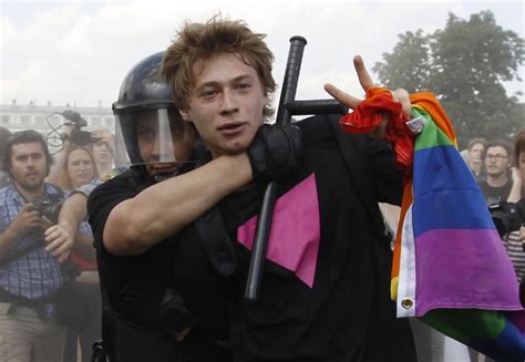 gay rights activists clash with homophobic protesters in russia [photos]