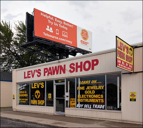 banking  rich  poor bank billboard   pawn shop photograph  christopher crawford