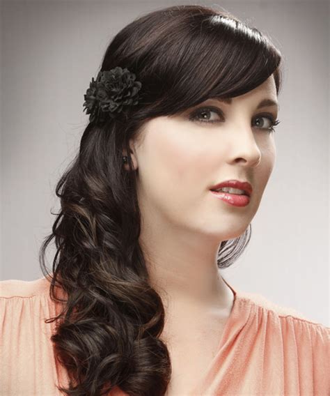 long curly dark brunette half up hairstyle with side swept bangs