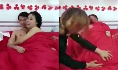 video shows chinese wedding guests force bride and groom to strip off and have sex daily mail
