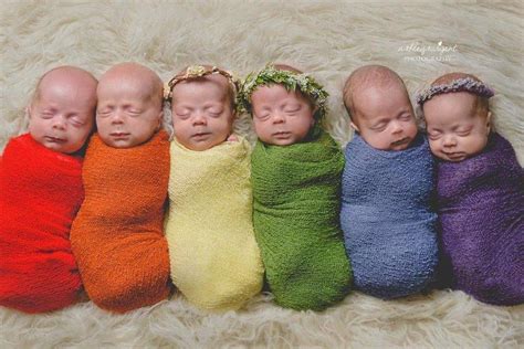 sextuplet photoshoot shows alabama babies  colourful outfits lined    rainbow