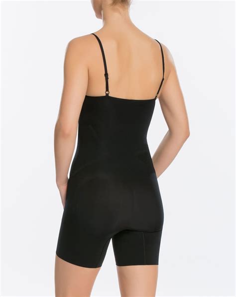 spanx oncore mid thigh bodysuit in black lyst
