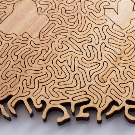 create   custom jigsaw puzzle nervous system lasercut wood