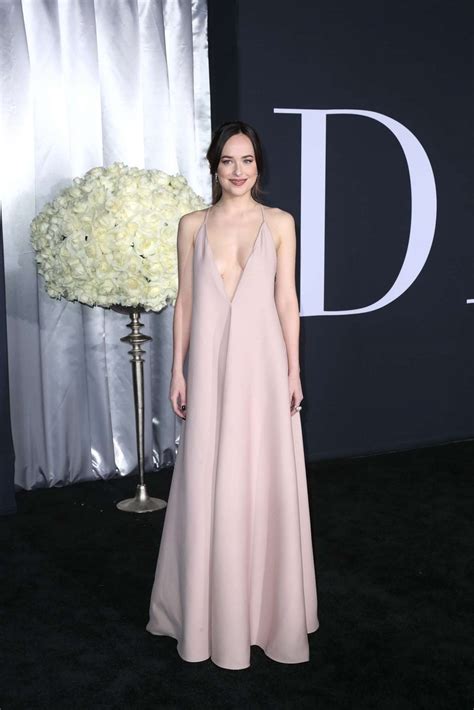 Dakota Johnson Smoulders As She Goes Braless For The Fifty