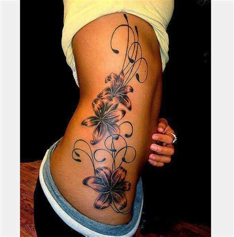 12 lily flower tattoos design ideas rib tattoos for women feminine tattoos tiger lily tattoos