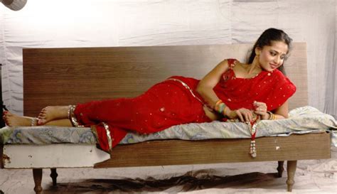 Actress Anushka In Vaanam Movie Spicy Stills Hot Celebs Round The World