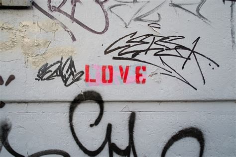 image   word love stenciled   wall  graffiti austockphoto