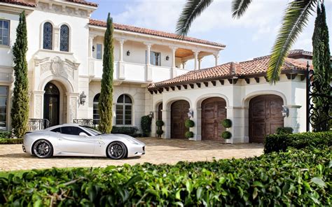 A Look At Some Mansions With Expensive Cars Parked In