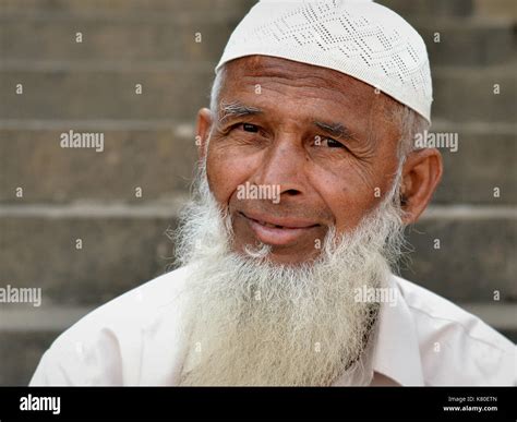 elderly indian muslim man  islamic beard wearing  white prayer cap