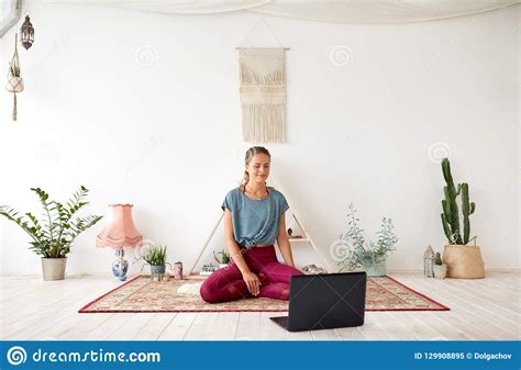 woman  laptop computer  yoga studio stock image image  retreat relaxation