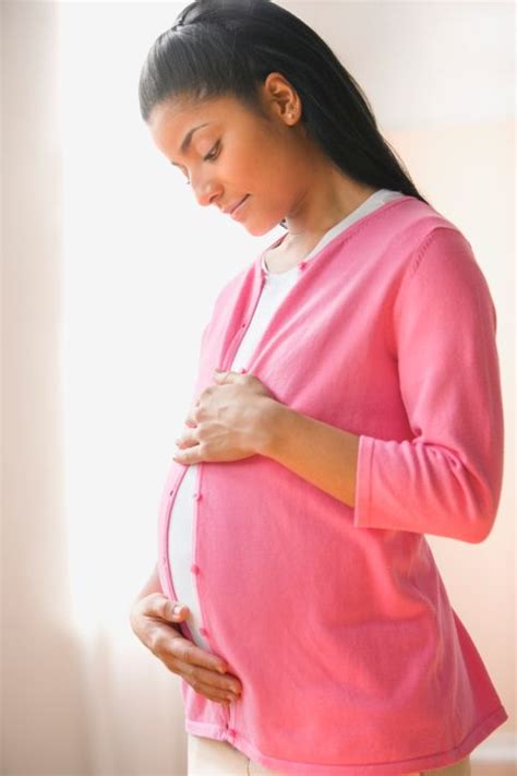 Latina Woman Pregnant Belly Kicks Pregnantbelly