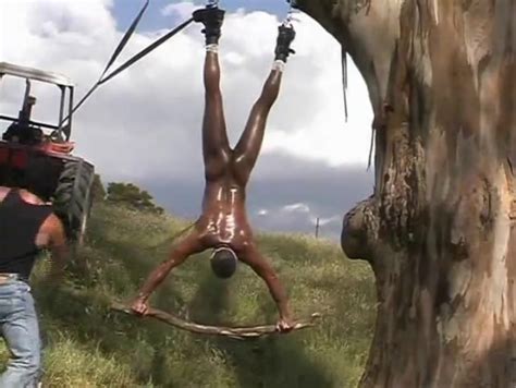 Black Guy Chained To A Tree And Whipped Outdoors Gay