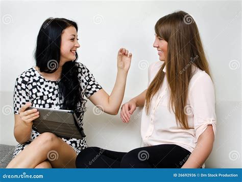 young women chatting stock photo image  equipment