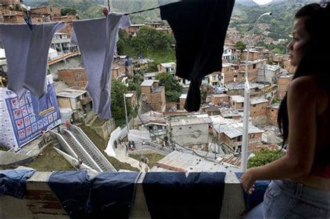 outdoor escalator opens in medellin slum in colombia ritemail