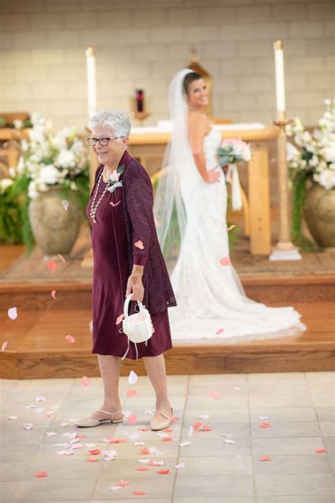 83 year old grandmother wins hearts as the flower girl at her