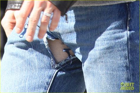 full sized photo of aaron taylor johnson rips crotch in jeans on