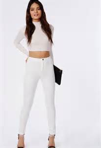 kim kardashian wears skintight white jeans on lego store visit with
