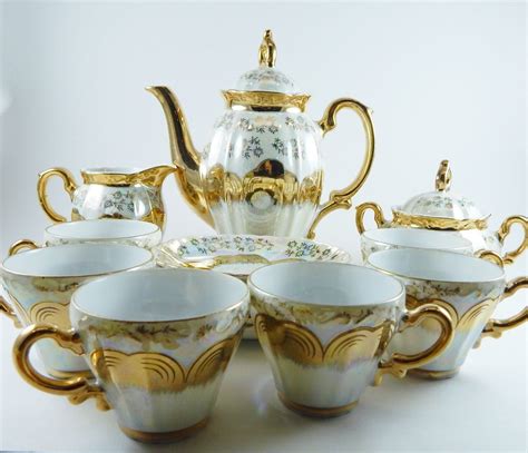 sterling china japan  piece tea set gold overlay opalescent flowered haute juice