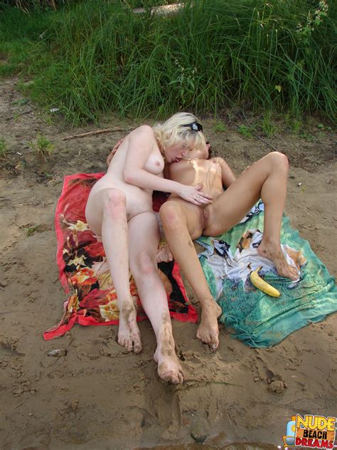 after having lesbian sex with fingers along with a banana these 2 cool off inside the ocean 03161