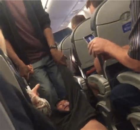 blame united airlines doctor dragged off kicking andscreaming after