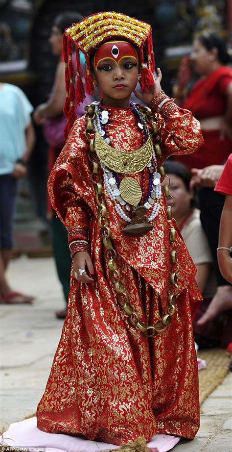seven year old girl is declared a living goddess in nepal