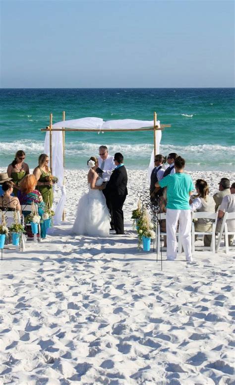 diy lesbian beach wedding with super hero wedding cake