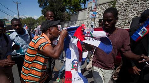 thousands of haitian protesters decry violence against countrymen in