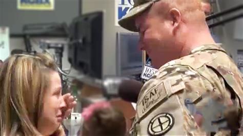 pregnant wife surprised by returning soldier husband during live radio