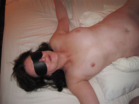 mature blindfolded and nude
