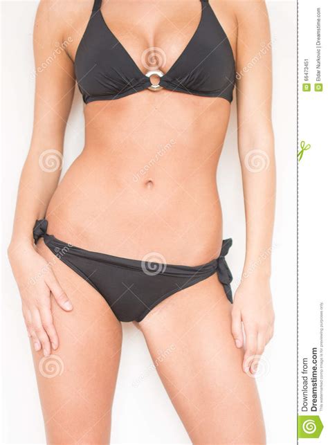 tan woman in bikini showing summer hot fit body perfect