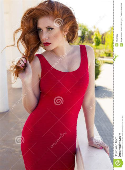Beautiful Woman With Red Hair And Freckles Stock Image
