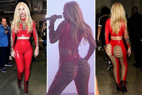 Iggy Azalea Bares Her Bum In Raunchy Red Pvc Costume As She Performs At