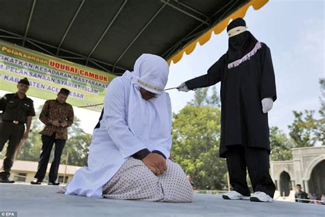 indonesian is whipped 100 times for sex outside marriage daily mail