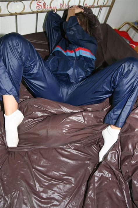 Woman Getting Hot And Bothered In A Pile Of Shiny Nylon Adidas