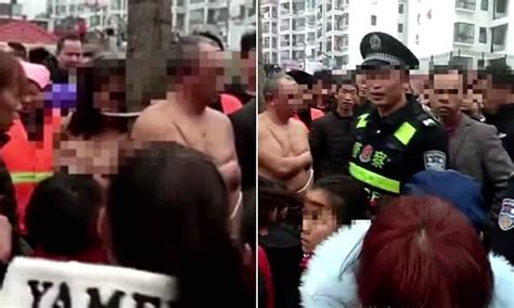 man and alleged mistress tied to a tree naked after wife caught them cheating
